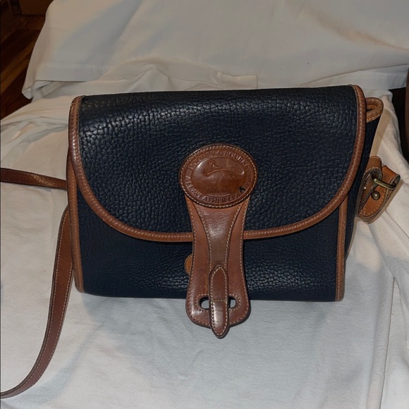Dooney & Bourke Handbags - Vintage Dooney & Bourke Black and Tan All-Weather Leather Shoulder Bag